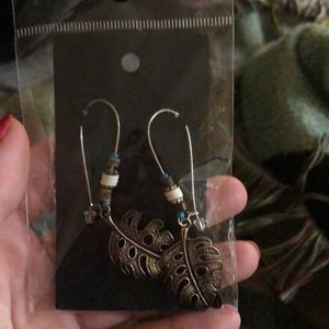 New never worn Leaf earrings